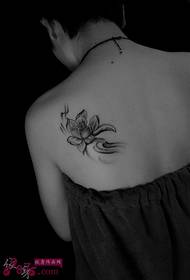 Small fresh lotus black and white tattoo