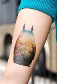 Girl painted on the arm of the totoro silhouette plant material tattoo picture