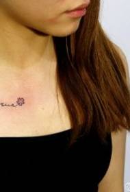 Four-leaf clover tattoo pattern at the collarbone