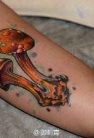 Popular mushroom tattoo pattern on the inside of the arm