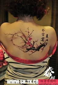 Beautiful girl's popular plum tattoo pattern on the back of the girl