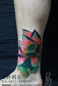 Black lotus tattoo pattern on calf