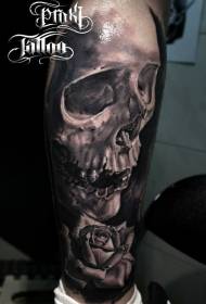 Legs of lifelike black gray human skull and rose tattoo pictures