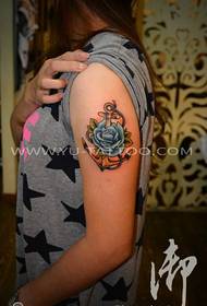 Female arm color anchor rose tattoo pattern
