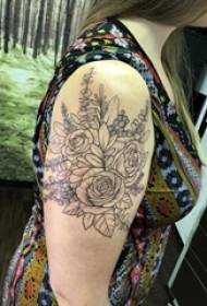 Girl's arm on black line art small fresh beautiful flower tattoo picture
