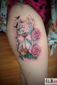 Different rose hourglass tattoo