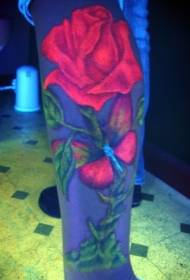 Fluorescent red rose and green leaf tattoo pattern