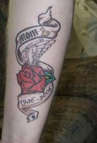 Arm colored red rose tattoo in love memory