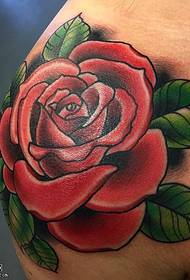 Red rose tattoo pattern on the shoulder