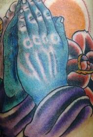 Blauwe biddende handen en roos tattoo patroon