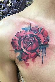 Bloody rose tattoo on the shoulder