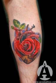Kleurich rose hert tatoeëringfoto op 'e skonk