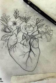 Manuscript sketch heart flower tattoo pattern