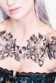 Girl under the clavicle black sketch creative beautiful flowers skull tattoo pictures