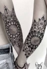 Flowering Mandala tattoo picture on a set of small arms