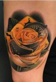 Female arm colored yellow rose tattoo pattern