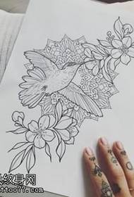 Manuscript line floral tattoo pattern