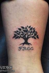 Totem tree tattoo pattern popular in the leg
