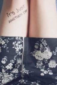 Simple English tattoo pattern on the legs