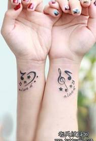 Girl's arm small and exquisite totem note tattoo pattern