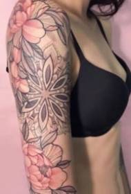 A pair of beautiful tattoo pictures with plain flowers and pink