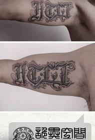 Klasikinis gotikinis tatuiruotės modelis ant rankos vidinės pusės