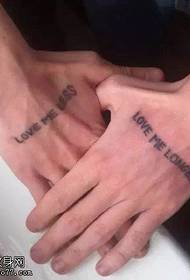 English font tattoo on hand