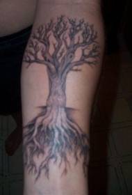 Arm black tree roots with dry branches tattoo pattern