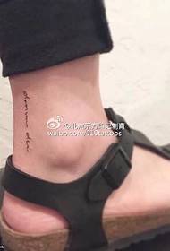 Siamese small character tattoo on the ankle