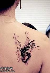 Modello tatuaggio totem fiore vite posteriore