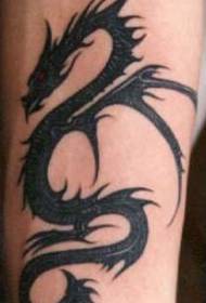 Motif de tatouage oeil rouge dragon noir tribal