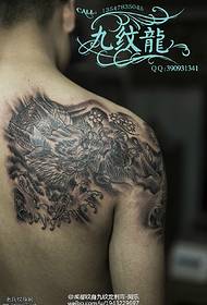 a Chinese dragon tattoo pattern on the shoulder