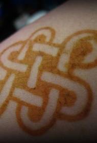 Golden Buddhist Symbol Tattoo Muster
