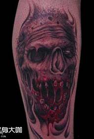 umlenze inyama skull tattoo iphethini