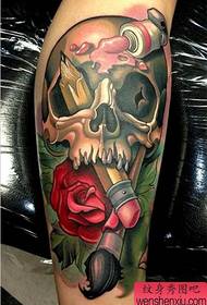 a classic on the calf School style skull tattoo works