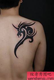 unicorn tattoo pattern: A shoulder totem unicorn tattoo pattern