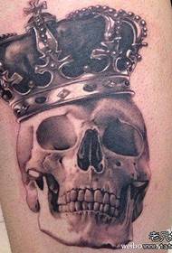 a cool classic skull and crown tattoo pattern