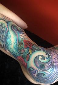 Убава полу-должина блескава тетоважа со феникс