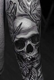 arm black and white skull tattoo pattern