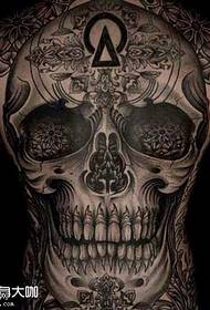 Esquena patró de tatuatge de crani de flors