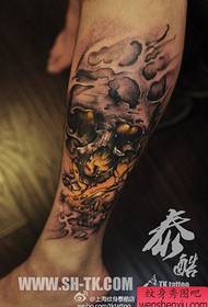 a popular sketch of a realistic tattoo in the leg