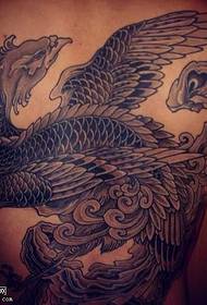 Phoenix tattoo pattern on the back atmosphere