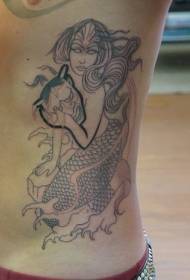 waist line mermaid and sea shell tattoo