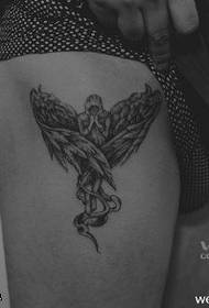 Angel tattoo pattern on the thigh