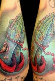 leg Color rosary prayer hands and zombie tattoo