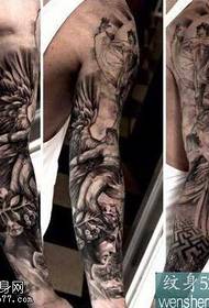 arm angel's tear tattoo pattern