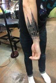 Boy's arm on the black point of the three-dimensional geometric line building tattoo picture