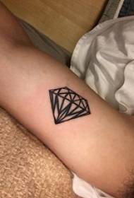 male arm on black geometric line diamond tattoo picture
