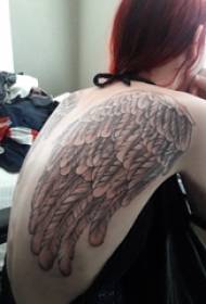 A fekete szürke pont hátulján levő lányok tövis egyszerű vonalú angyal szárnyakkal tetoválás képeket