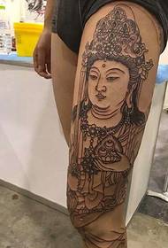 Thigh tribe personality black and white Guanyin tattoo